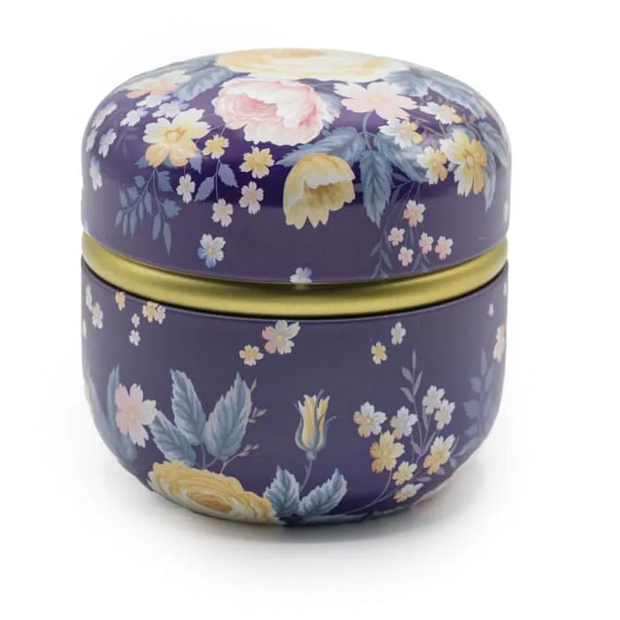Paars theeblikje met gele bloemen