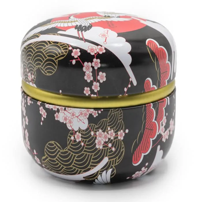 Zwart theeblikje met sakura-bloesem